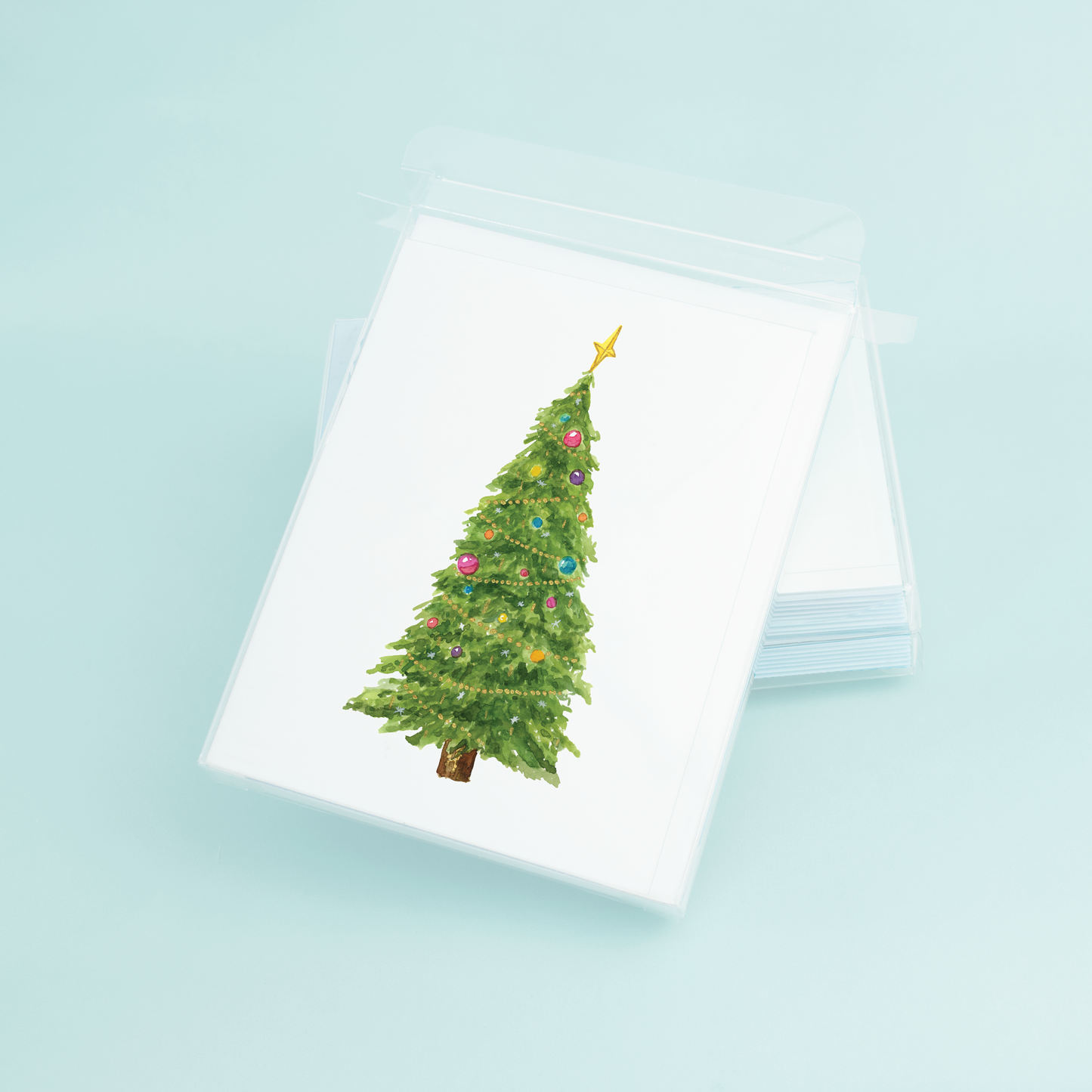 Stack of Christmas greetings cards with watercolor design